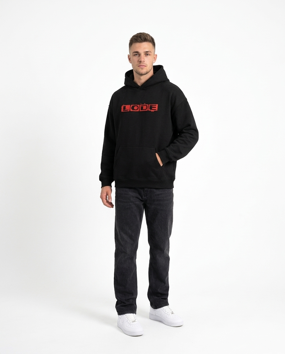 Black heavyweight drop-shoulder hoodie No. 01 front three-quarter view on model